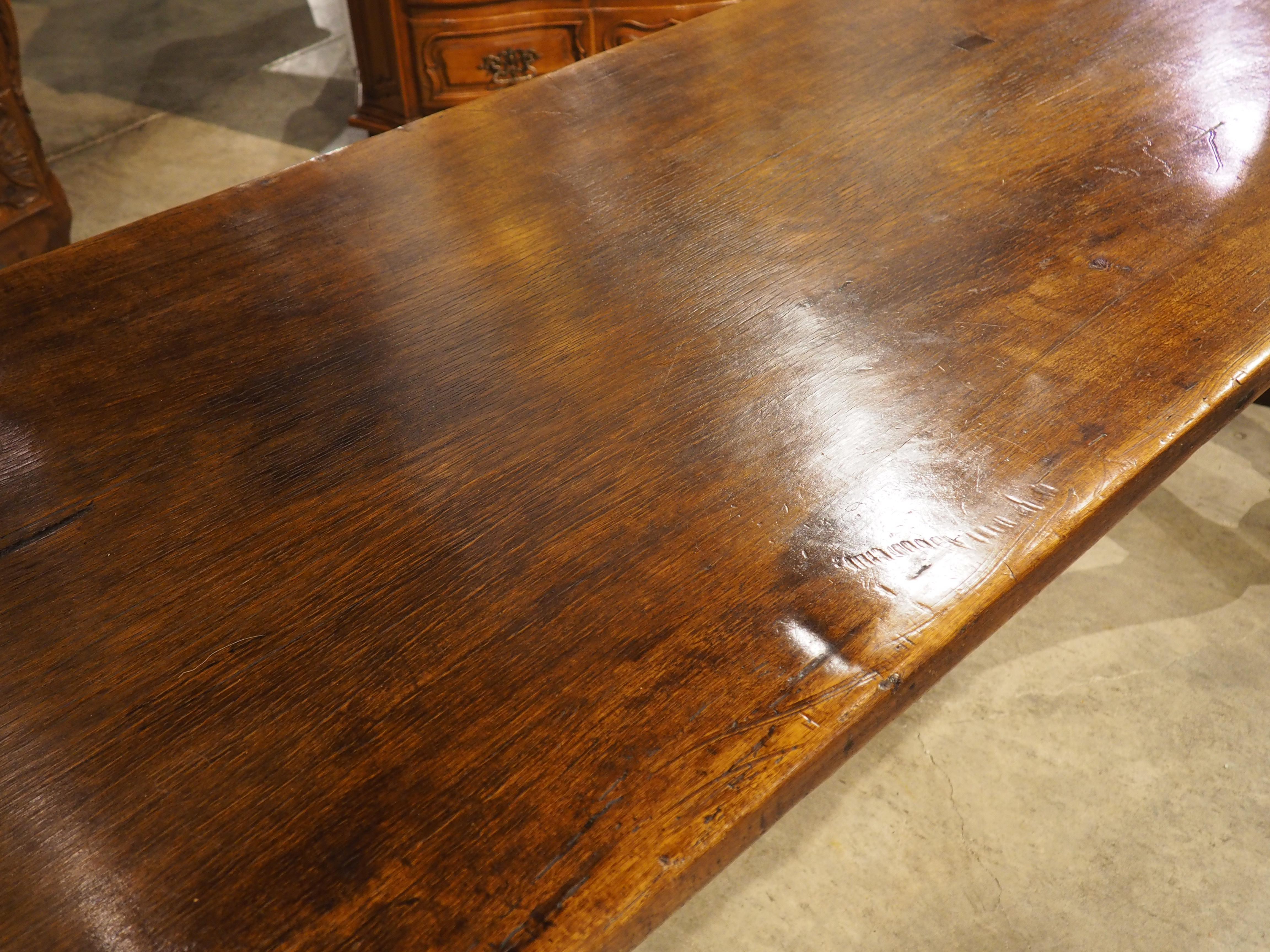 Spanish An Elegant 18th Century Single Walnut Plank Top Dining Table from Spain For Sale