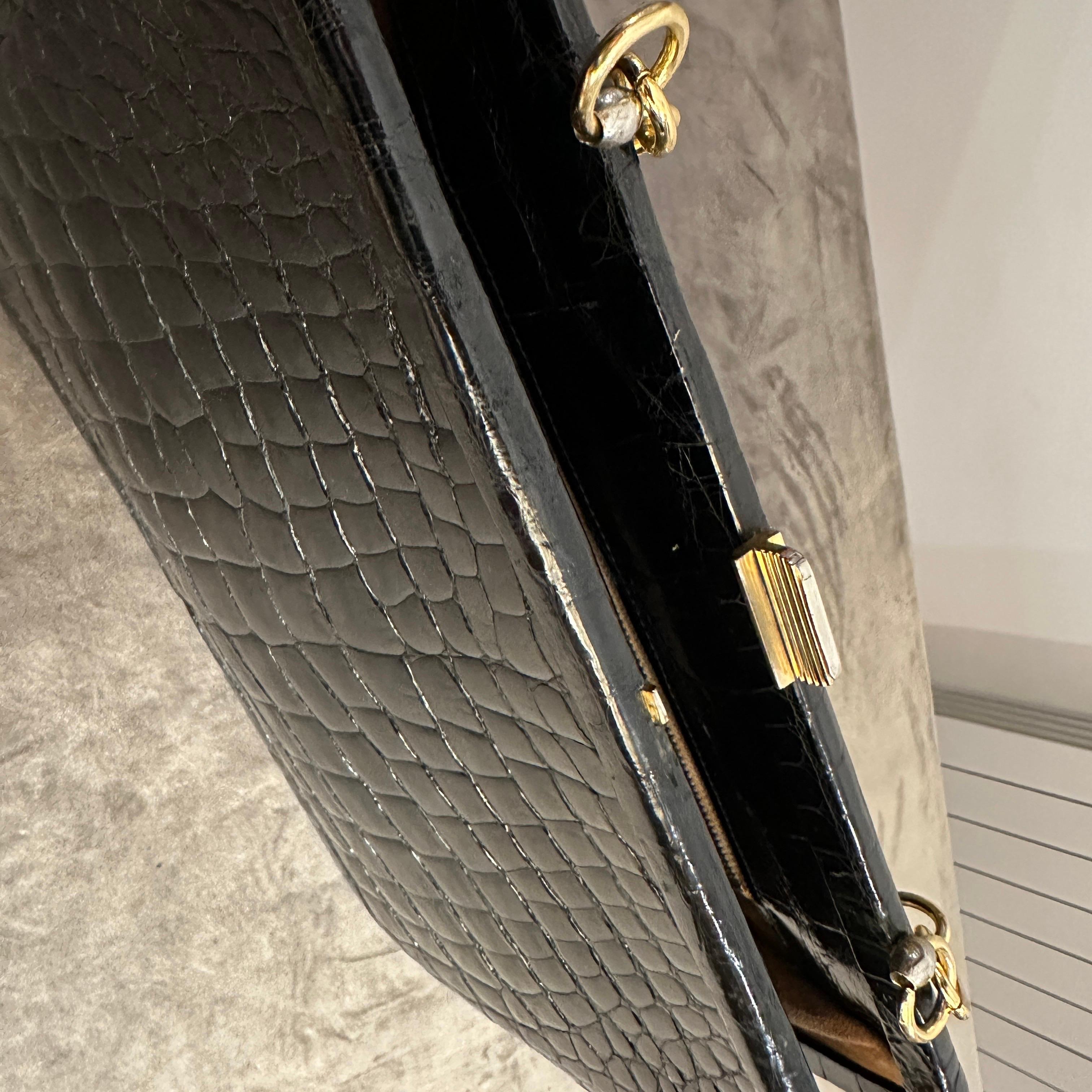 An Elegant 1950s Retro Black Leather and Brass Italian Shoulder Bag For Sale 8