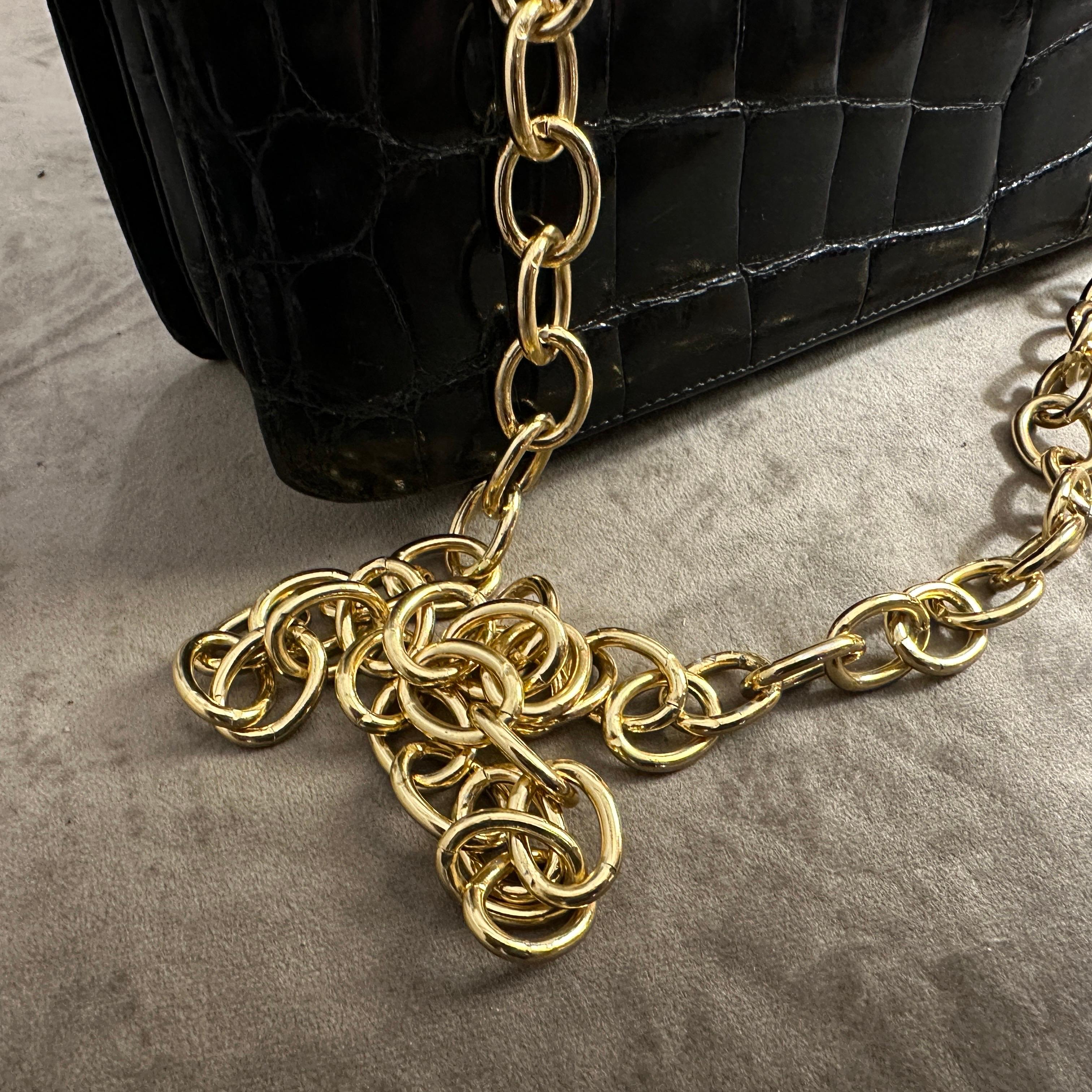 An Elegant 1950s Retro Black Leather and Brass Italian Shoulder Bag For Sale 5