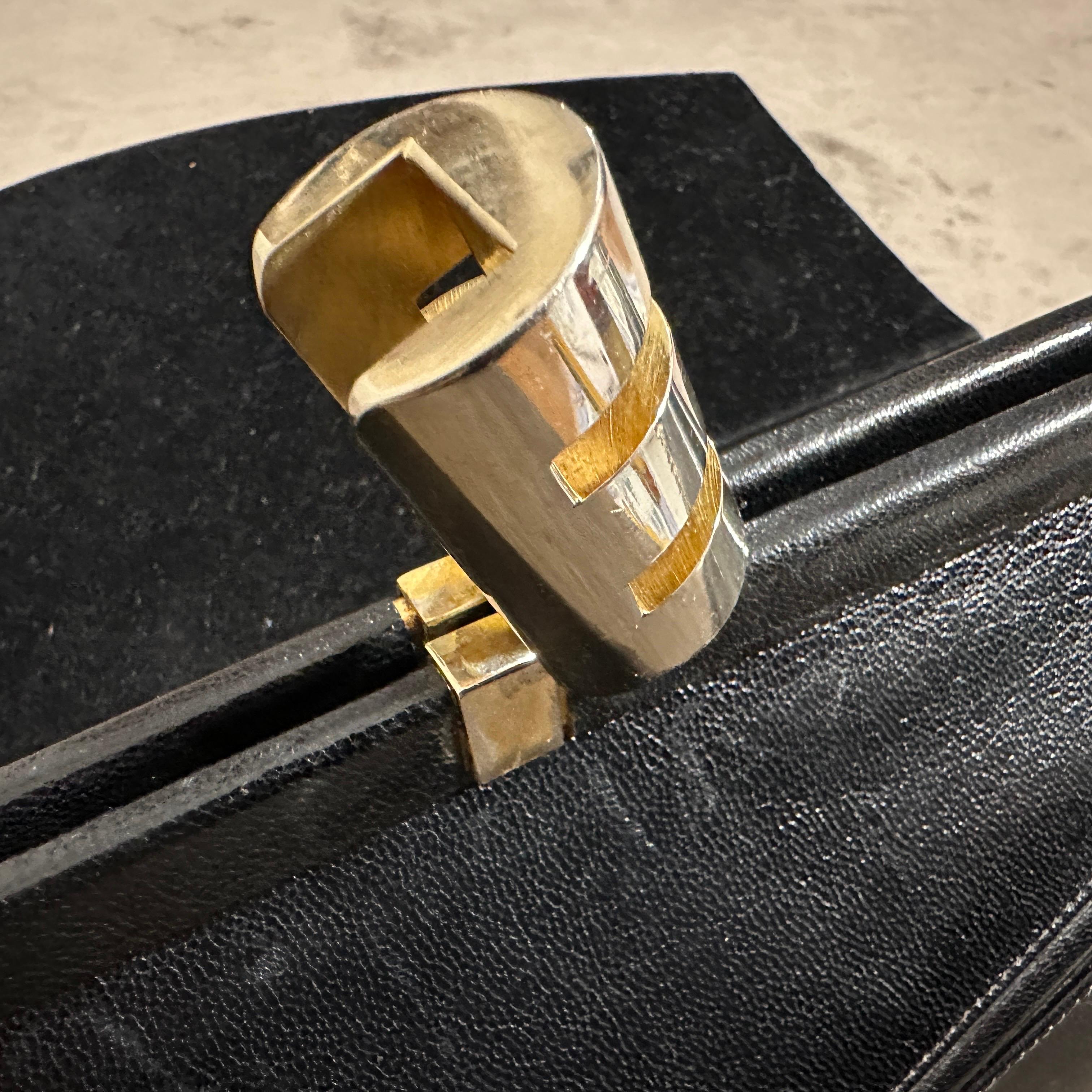 An Elegant 1960s Black leather and Brass Clasp Italian Clutch Bag For Sale 1
