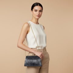 An Elegant 1970s Vintage and Black Embossed Brass Leather Shoulder Bag by Vien