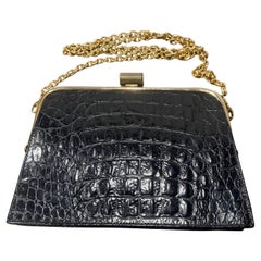 An Elegant 1970s Vintage and Black Embossed Brass Leather Shoulder Bag by Vien
