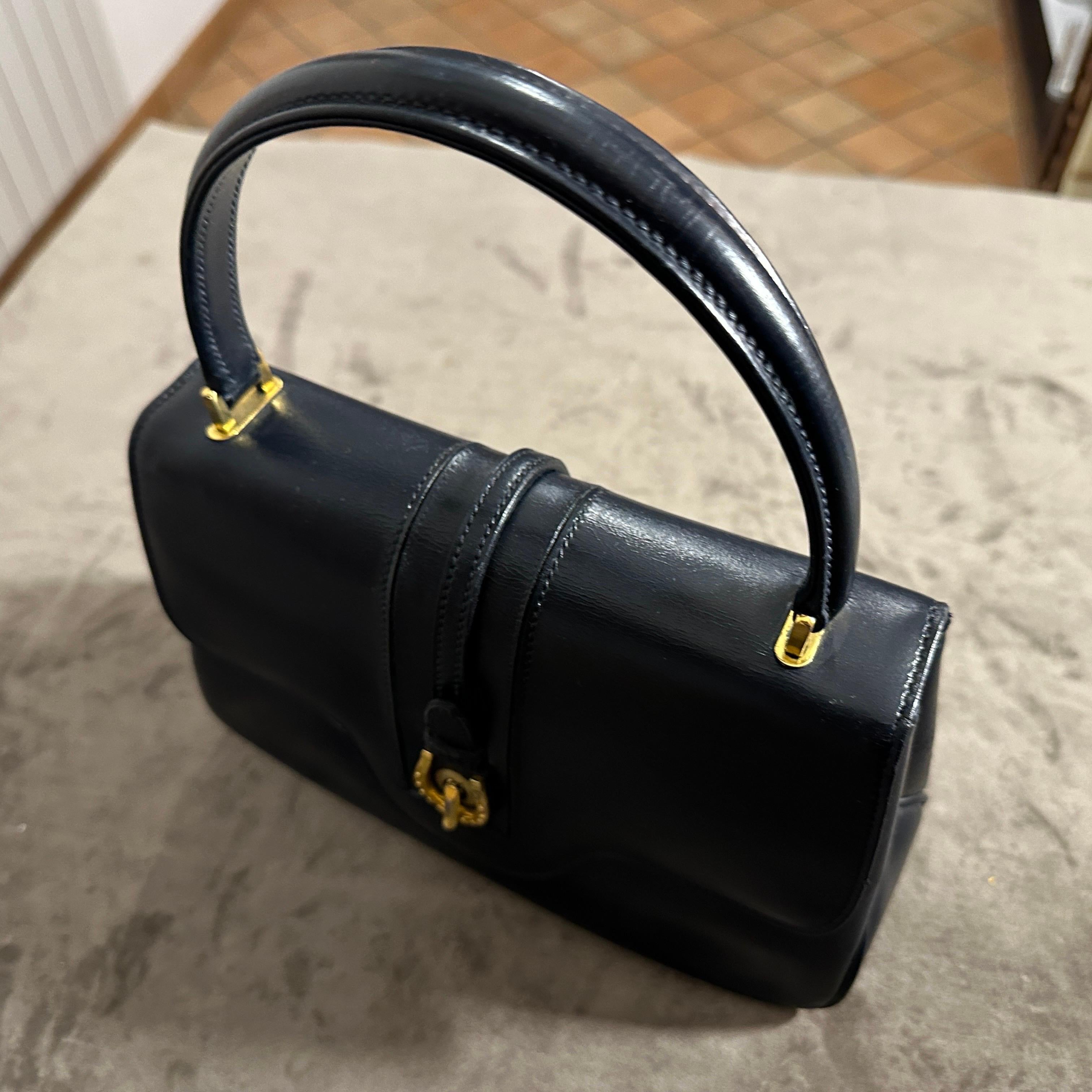 An Elegant 1980s Blue Leather and Brass Hand-Bag by Gucci 7