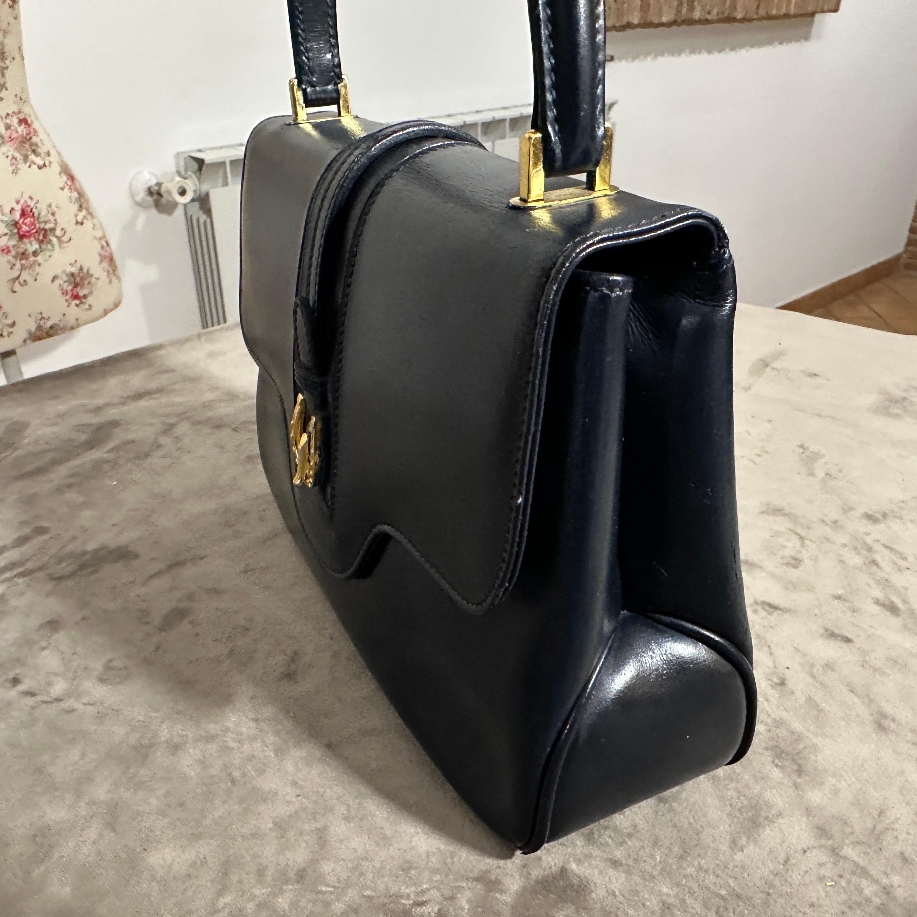 An Elegant 1980s Blue Leather and Brass Hand-Bag by Gucci 10