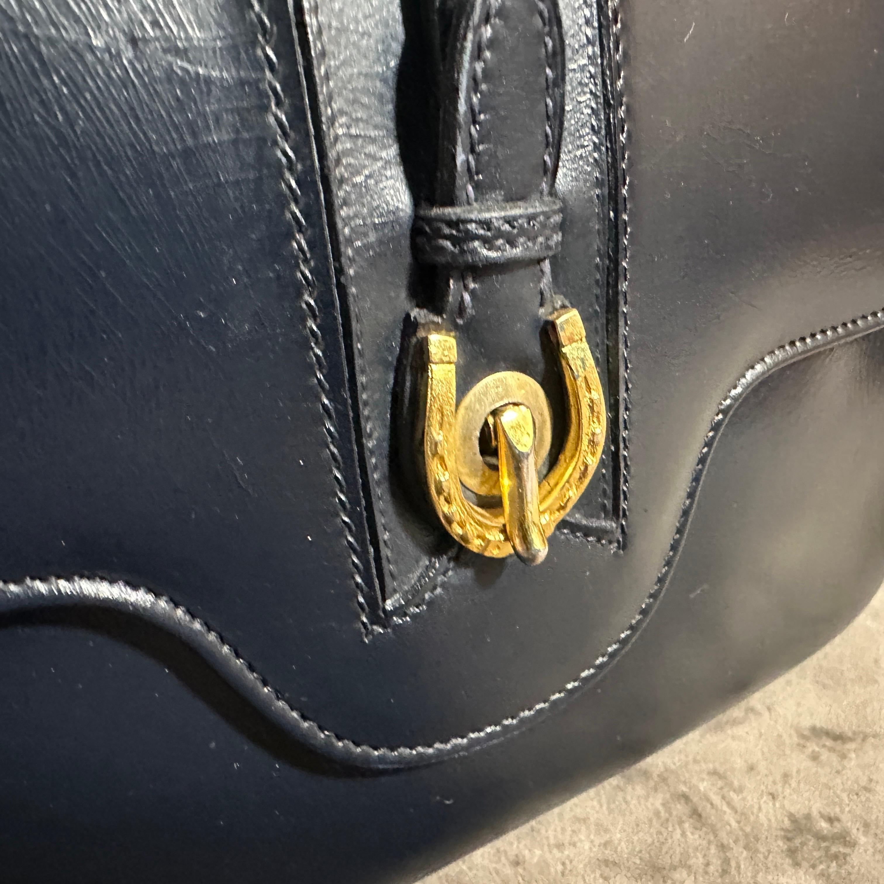 An Elegant 1980s Blue Leather and Brass Hand-Bag by Gucci 11