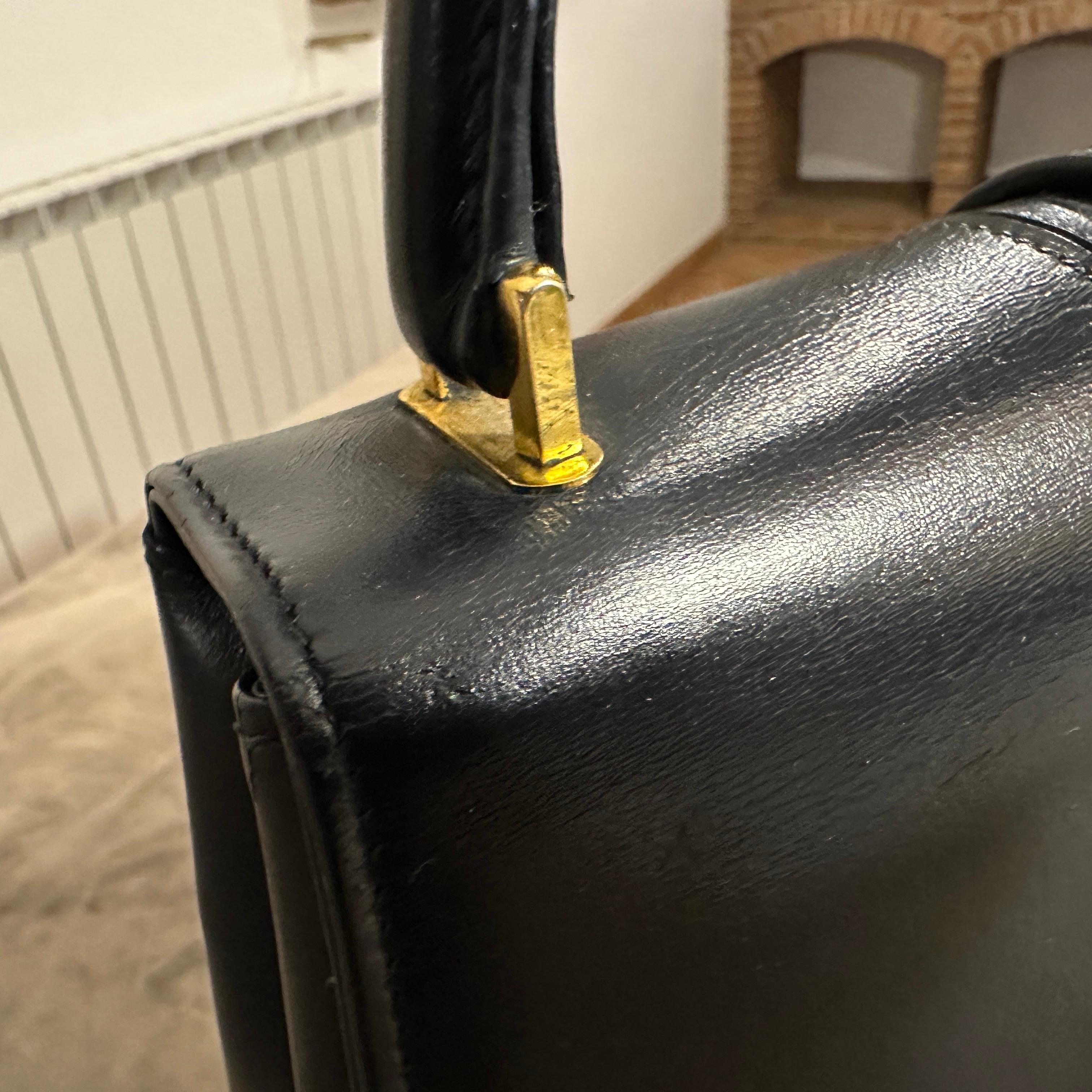 An Elegant 1980s Blue Leather and Brass Hand-Bag by Gucci 12