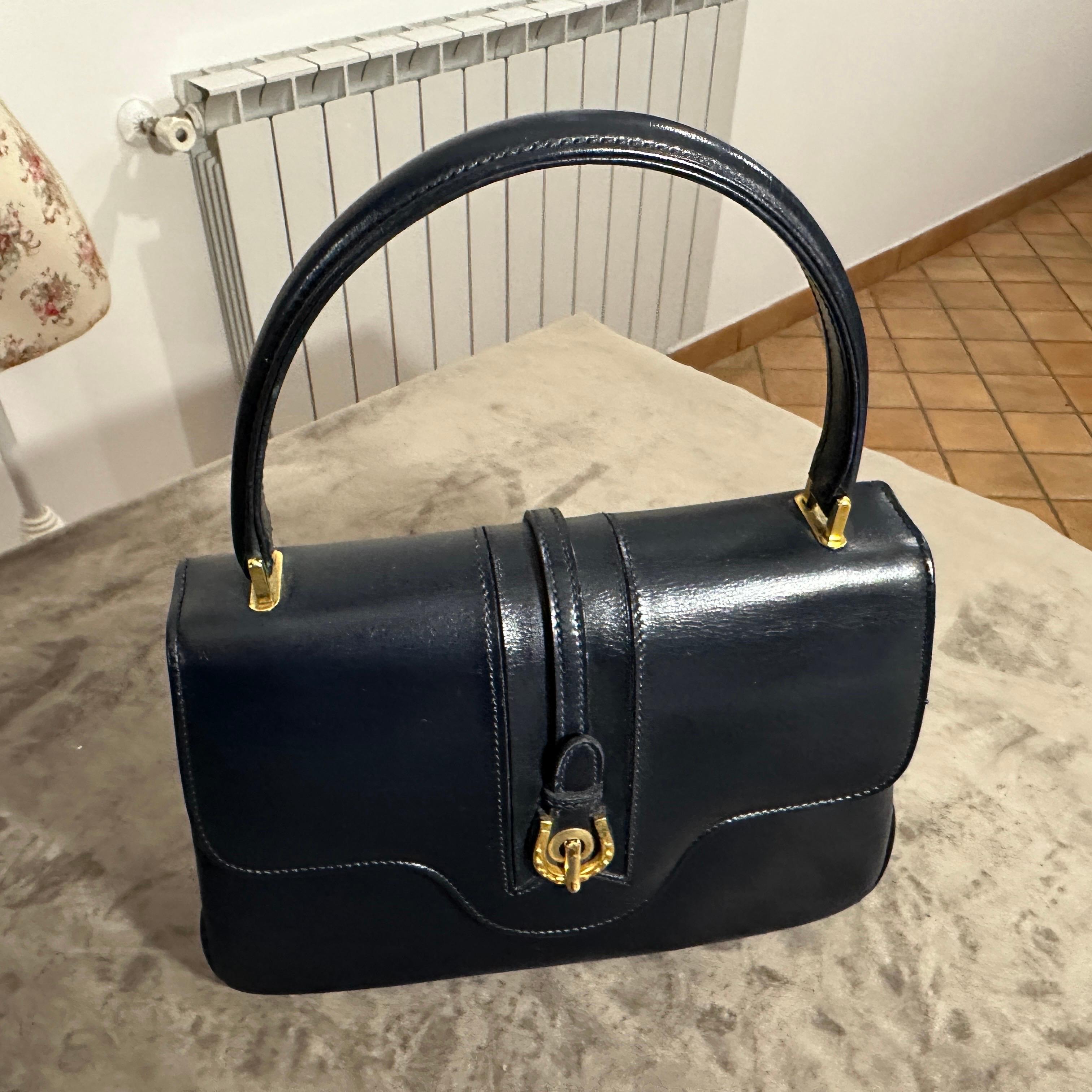 An Elegant 1980s Blue Leather and Brass Hand-Bag by Gucci 13
