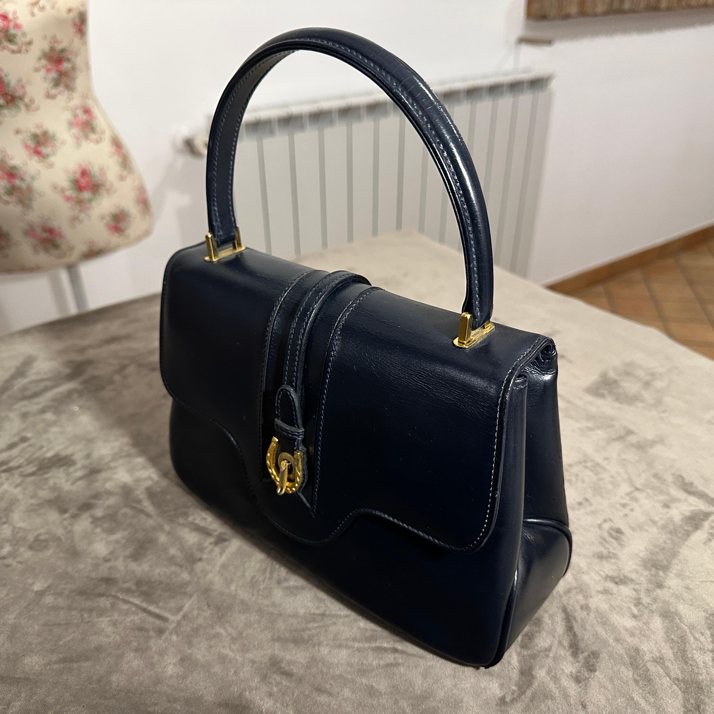 Black An Elegant 1980s Blue Leather and Brass Hand-Bag by Gucci