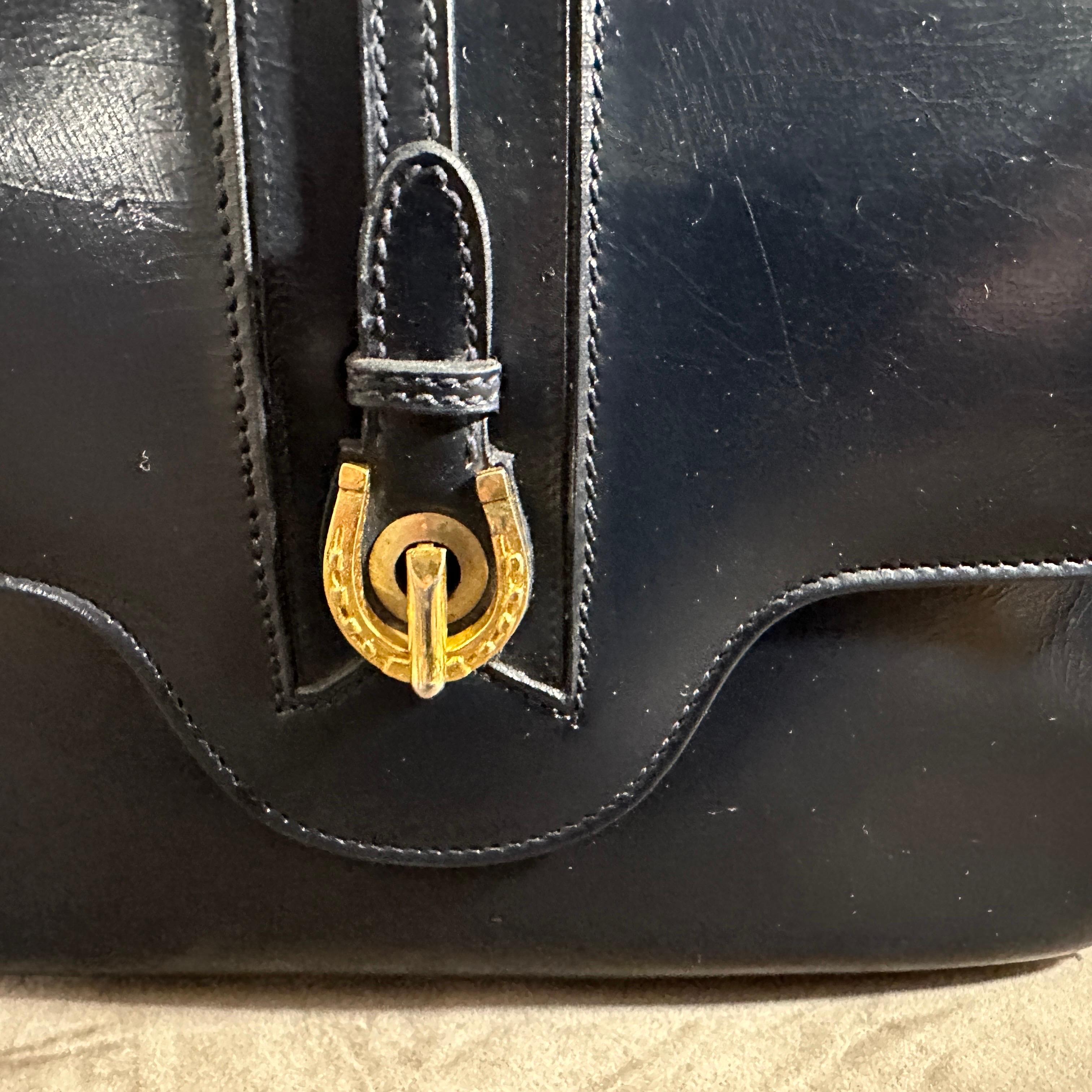 An Elegant 1980s Blue Leather and Brass Hand-Bag by Gucci 1