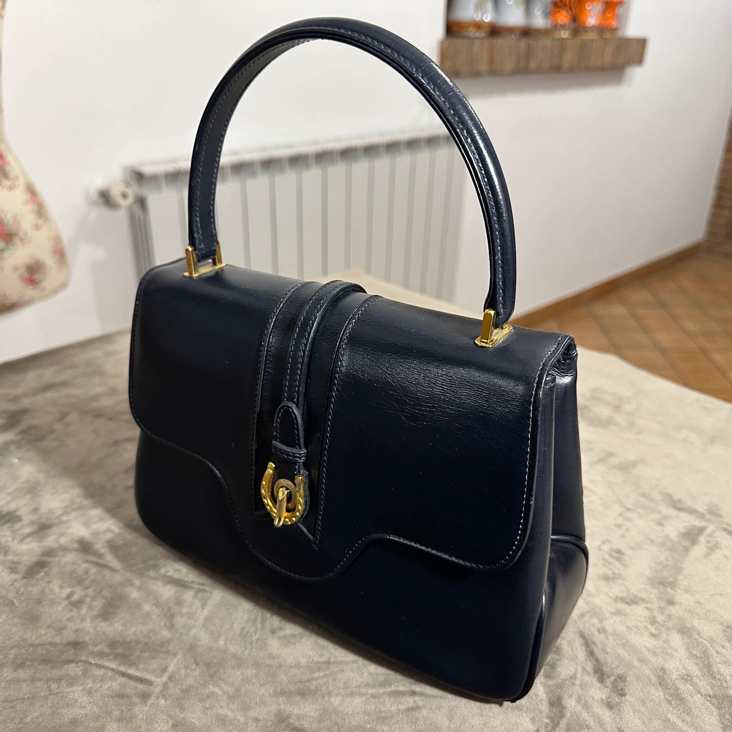 An Elegant 1980s Blue Leather and Brass Hand-Bag by Gucci 2