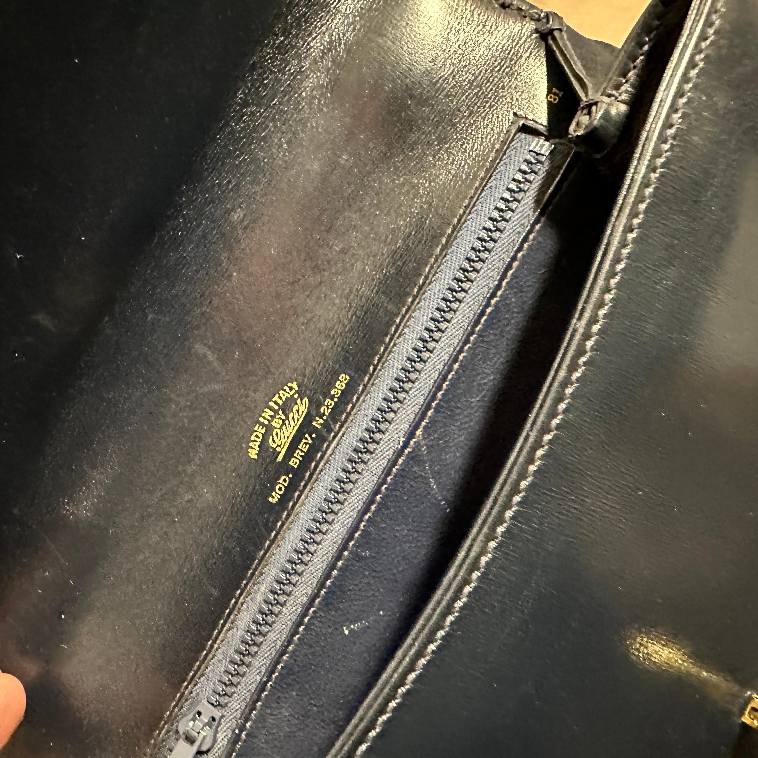 An Elegant 1980s Blue Leather and Brass Hand-Bag by Gucci 4