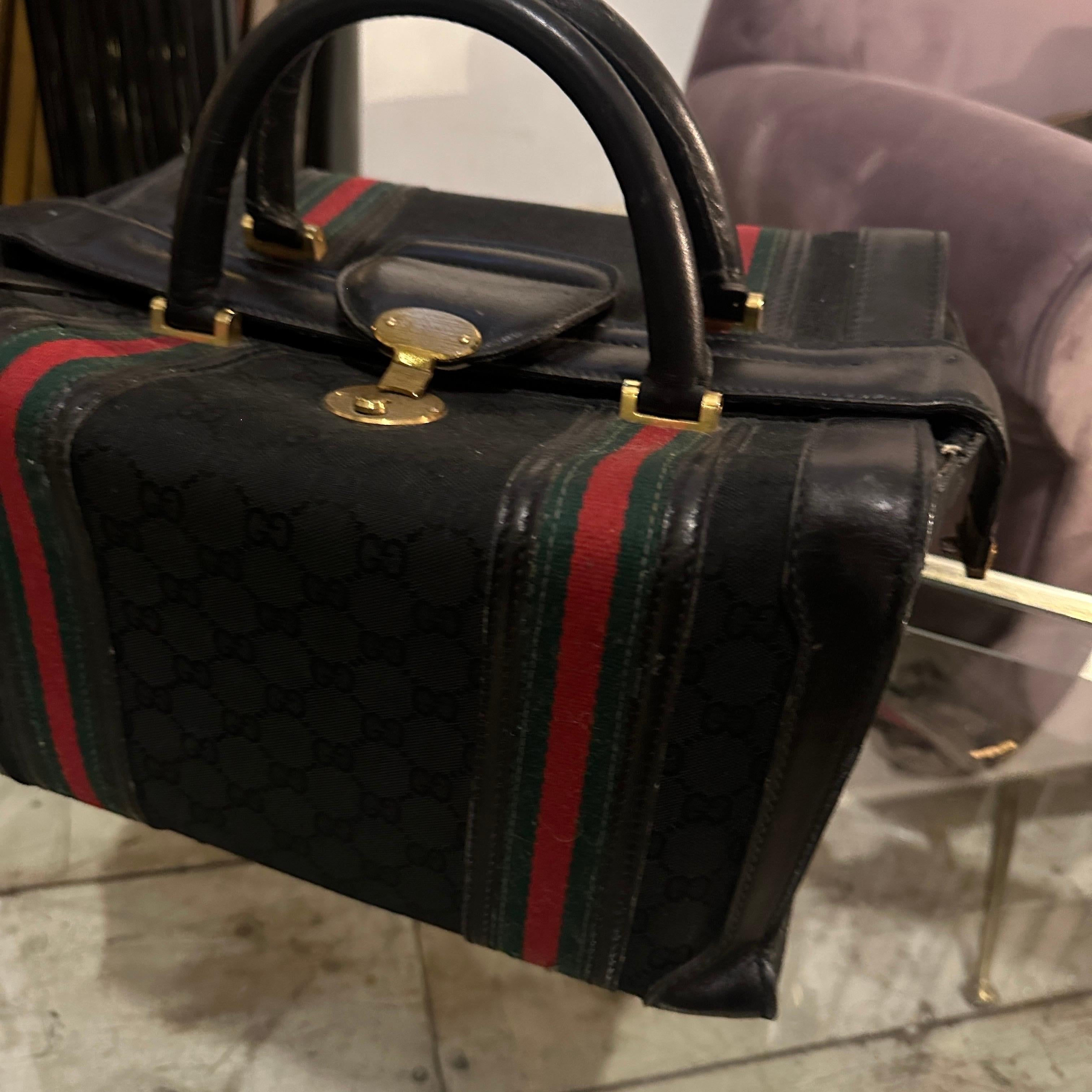 Black An Elegant 1980s Leather Small Travel Bag By Gucci For Sale