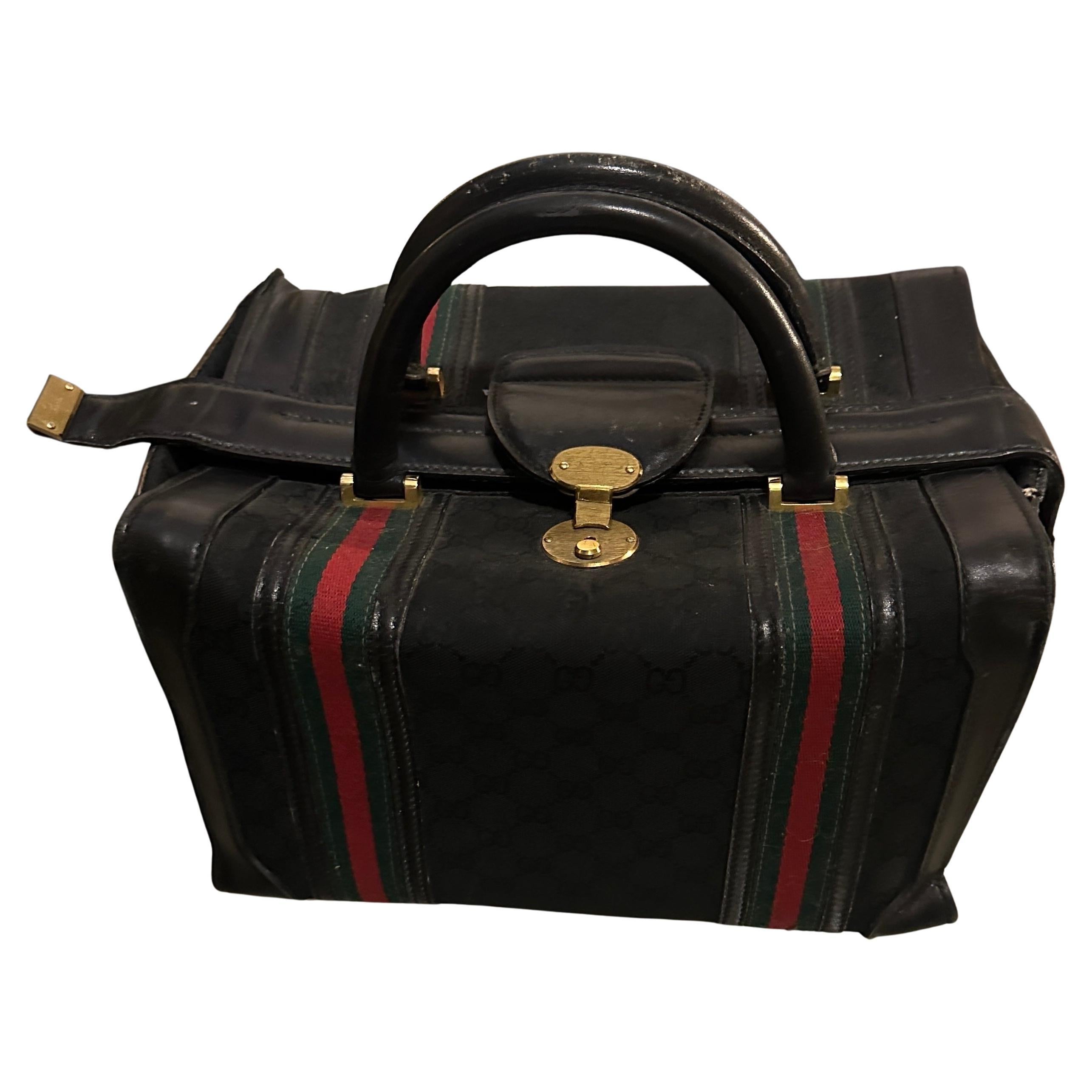 An Elegant 1980s Leather Small Travel Bag By Gucci