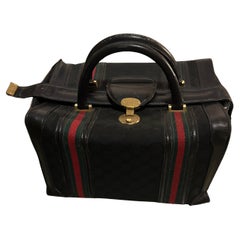 Petit sac de voyage élégant en cuir des années 1980 par Gucci