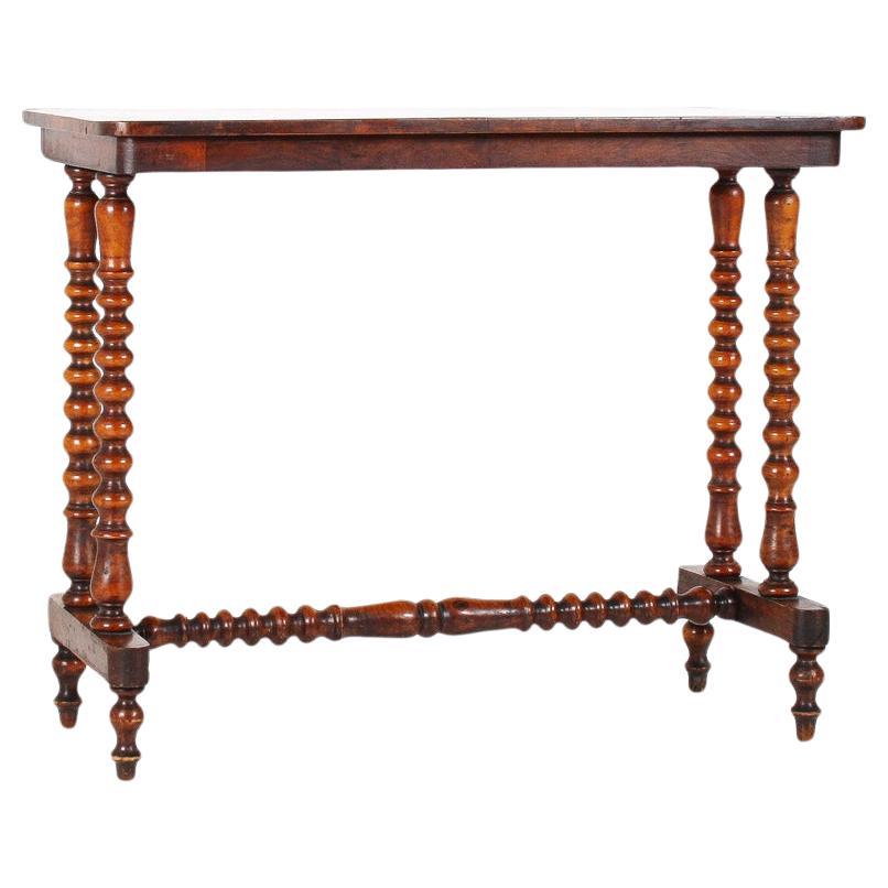 An elegant 19th Century Figured Walnut Bobbin Leg Stretcher Side Table