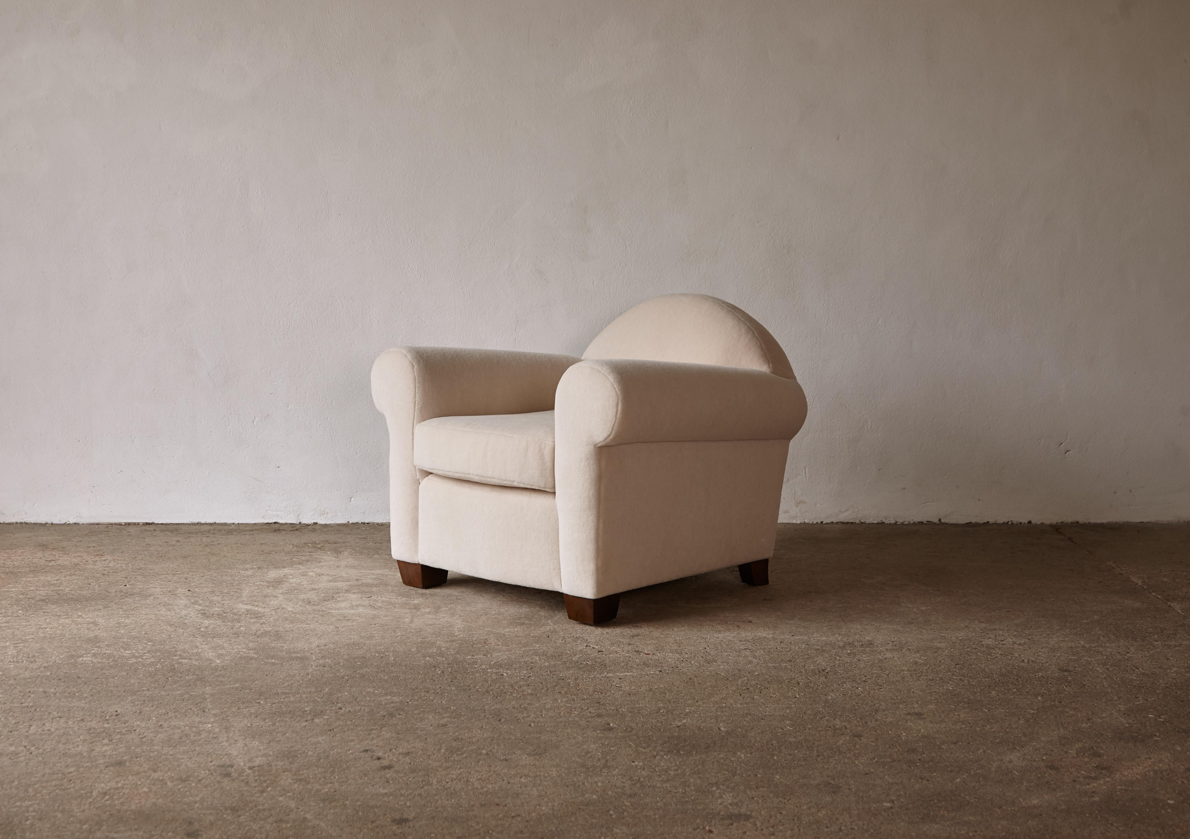 An elegant modern armchair, upholstered in pure alpaca wool. High quality hand-made beech frames and newly upholstered in an off white premium 100% alpaca. Fast shipping worldwide.




