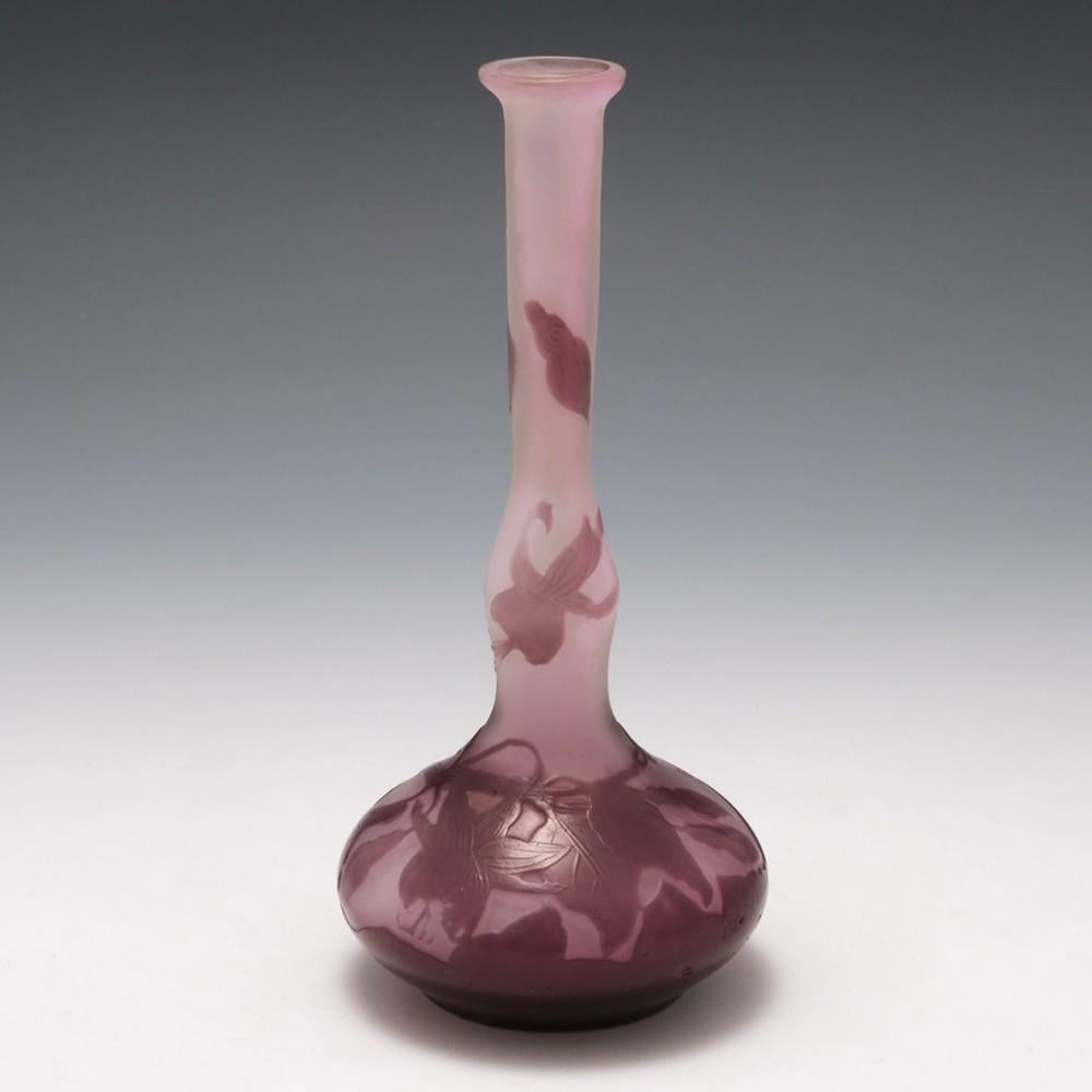 A Galle soliflor vase made between 1906 and 1914 in Nancy, France. The bowl features lilac and mauve fuschia flowers and leaves. It is signed Gallé.

Emile Galle was one of the foremost artists of 19th France; innovative, intelligent and adroit,