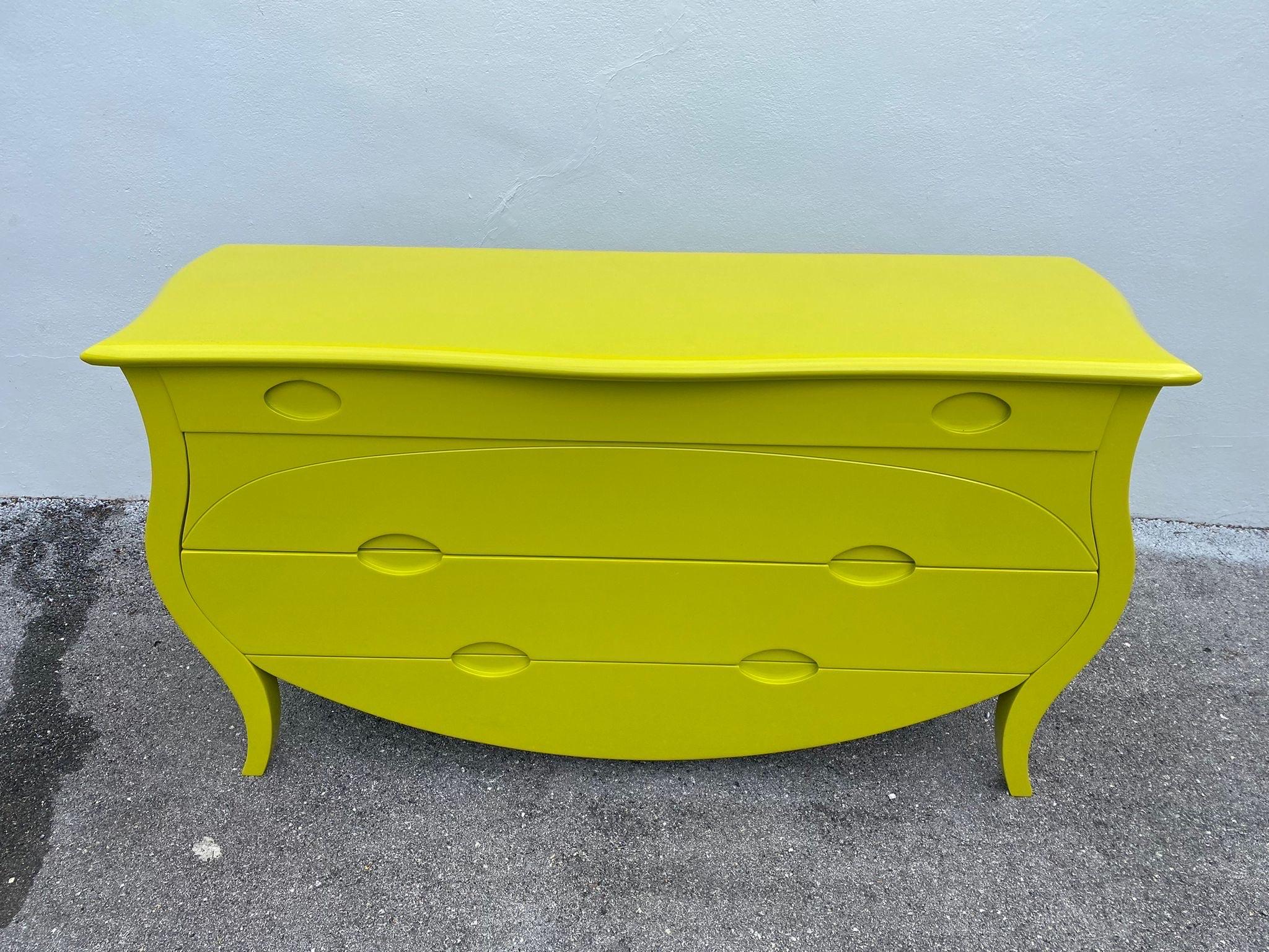 Whimsical Bombay style 4 drawer chest commode in an amazing chartreuse lacquer. Ample storage and stylish cabriolet design legs and overall curvy shape.