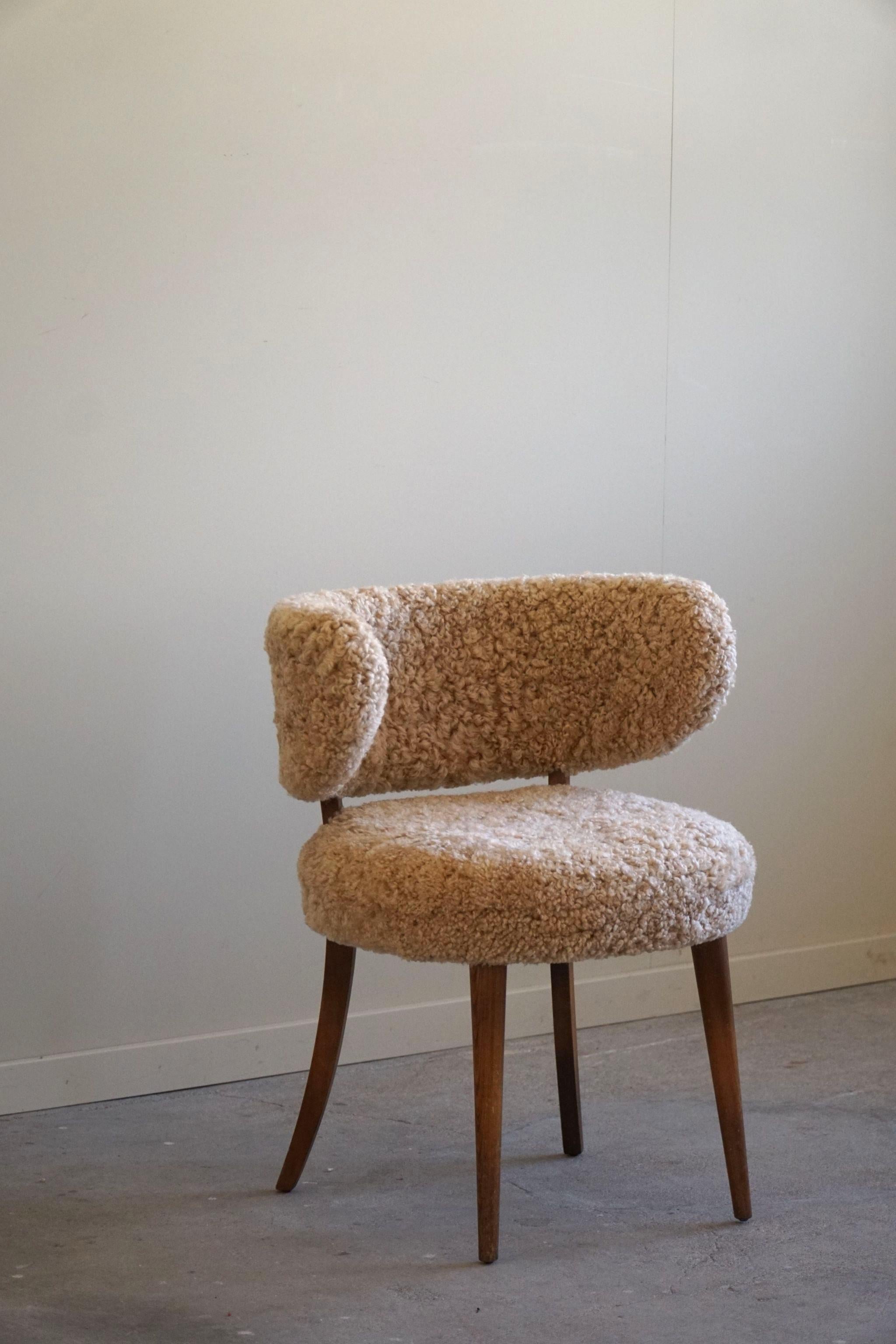 Lambskin An Elegant Danish Modern Low Back Chair, Reupholstered in Lambswool, 1940s