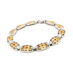 An elegant diamond and yellow and white gold bracelet 18k