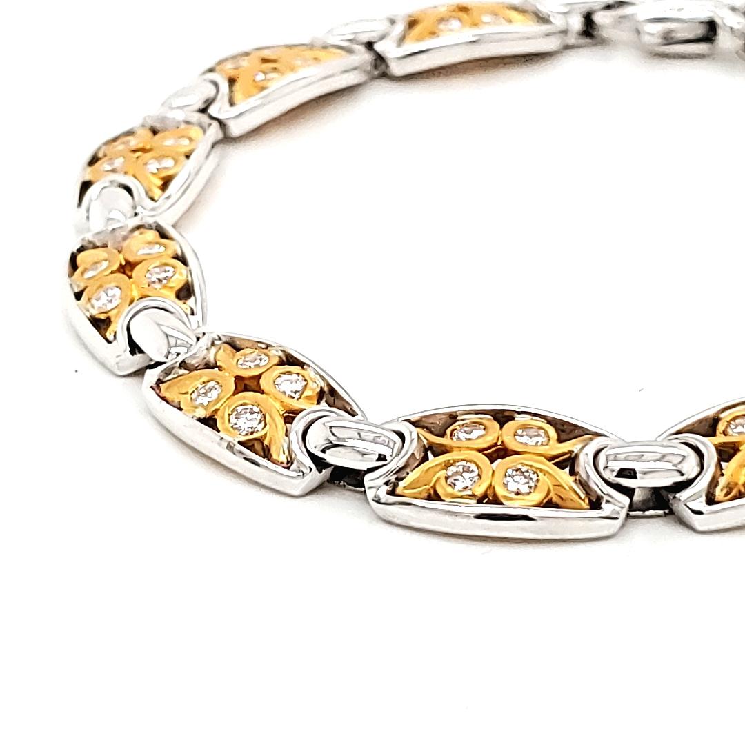 Round Cut An elegant diamond and yellow and white gold bracelet 18k For Sale
