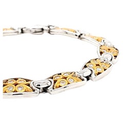 An elegant diamond and yellow and white gold bracelet 18k