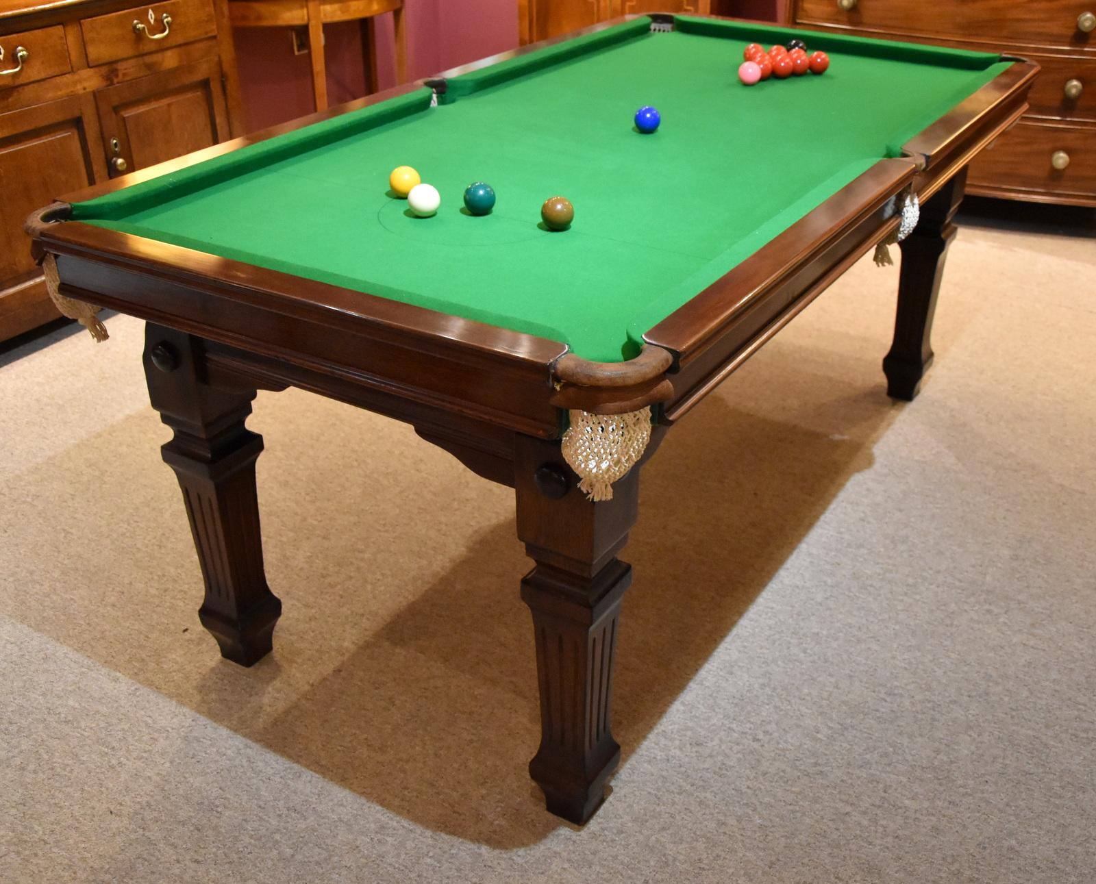 An elegant Edwardian metamorphic snooker table by Riley and sons turning into a dining table

Measures: Height 33