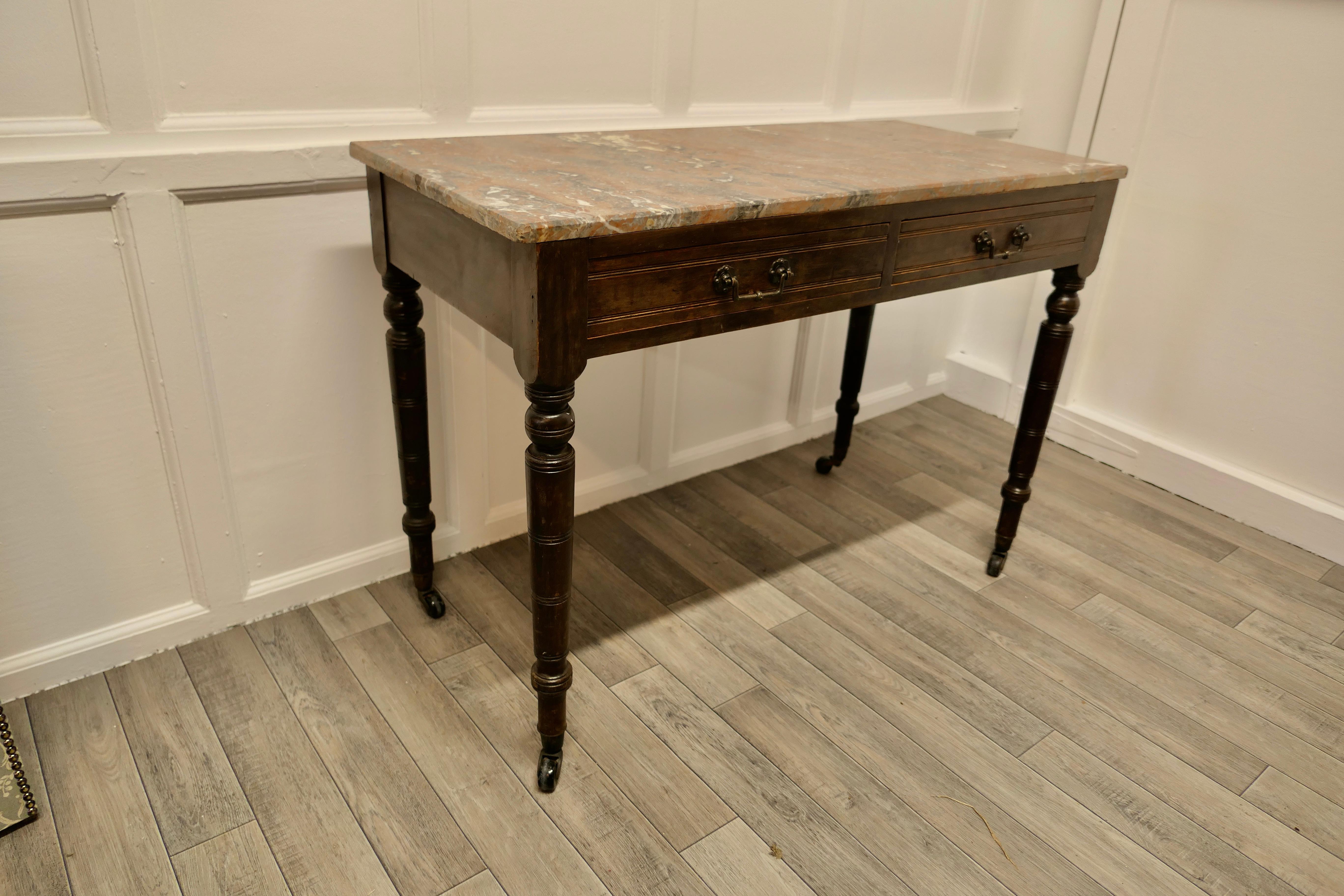 An Elegant Edwardian Pine Writing Table by Shoolbred 1