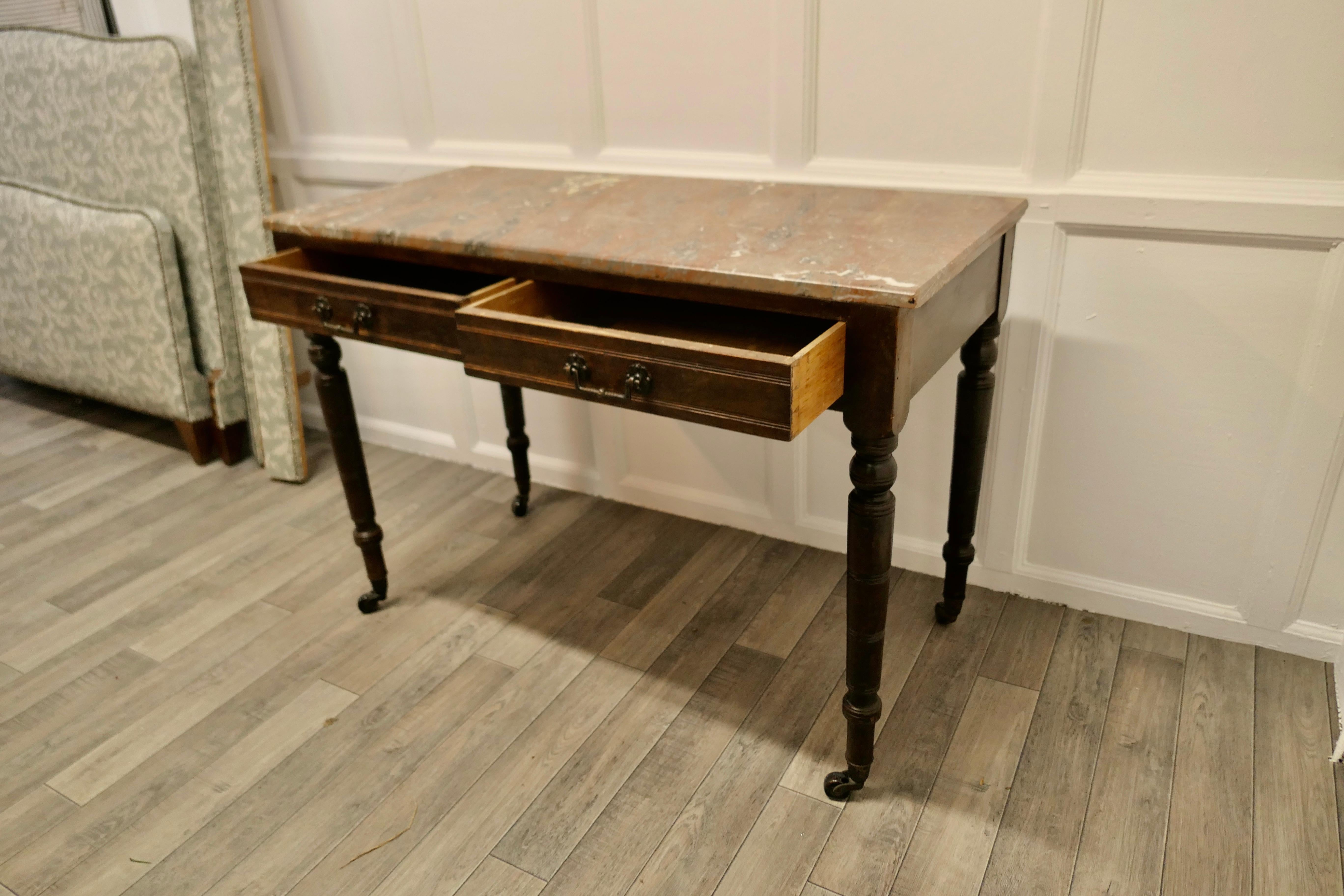 An Elegant Edwardian Pine Writing Table by Shoolbred 2