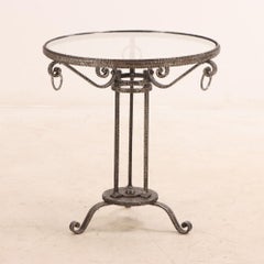 An Elegant French Art Deco Iron Glass Top Table, C 1930.