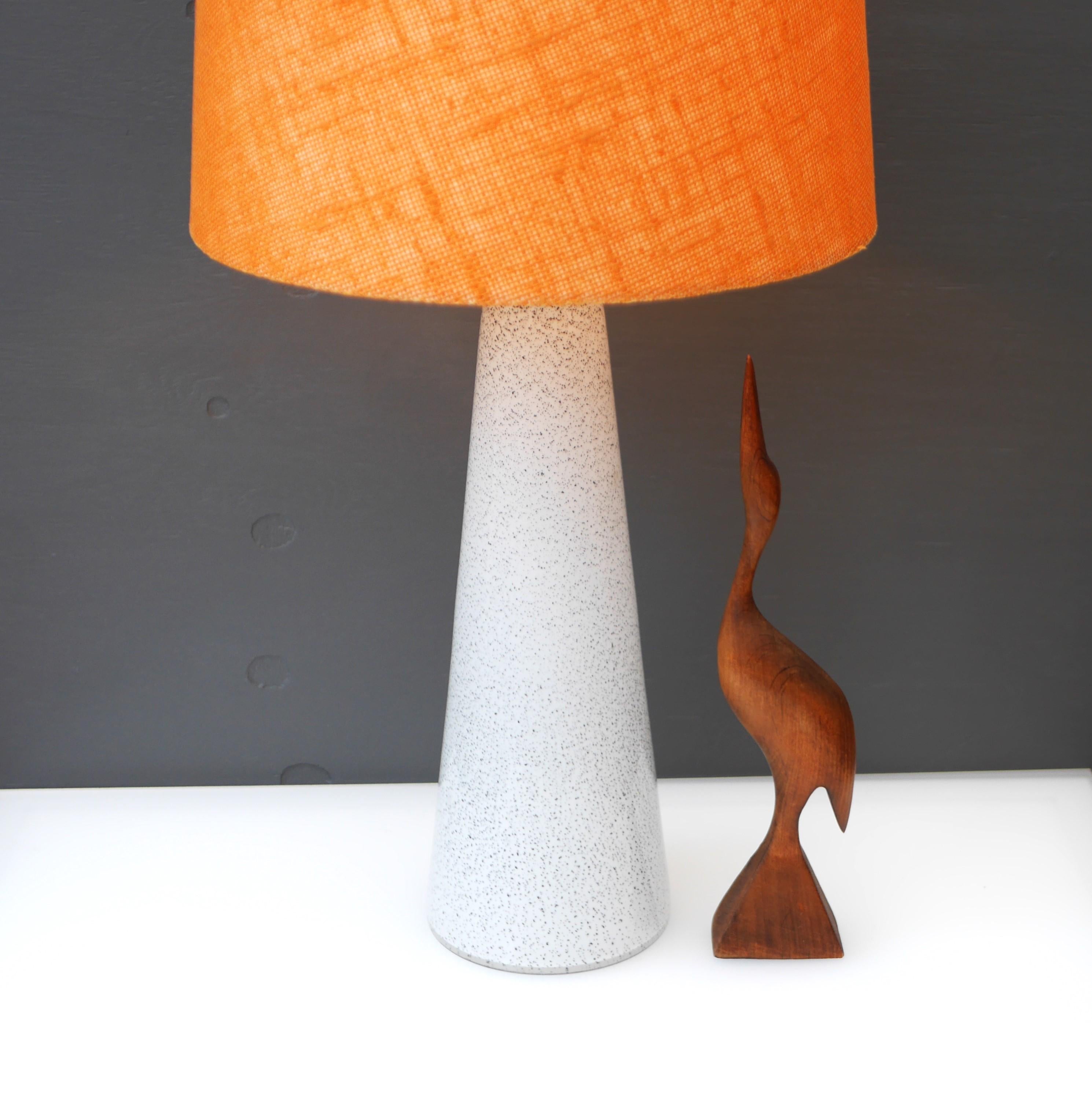 This is a beautiful, elegant, rather tall and slender hand-blown vintage glass lamp base, handmade by the talented Bengt Orup for Hyllinge glasbruk, Sweden. The piece has a beautiful and simple conical shape,  which gives a very modern feeling to