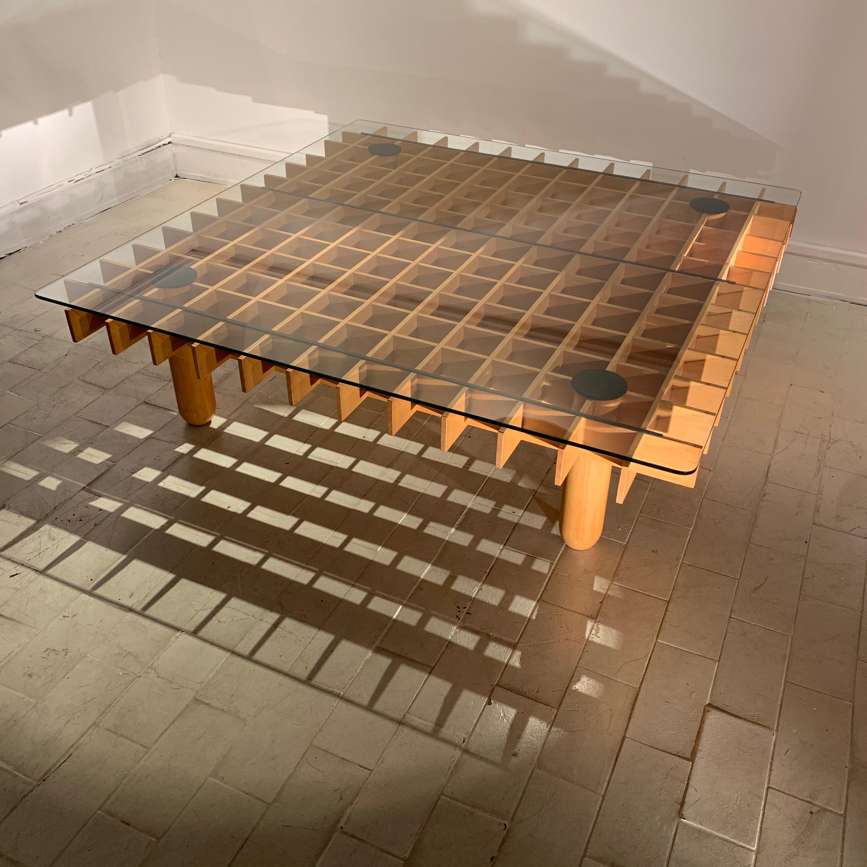 The table dates circa 1970s. This type of table is in the style of Gianfranco Frattini Kyoto table series. Common is the small square or rectangular model. This one is the large square one, which gives quite a presence as a coffee table, with a