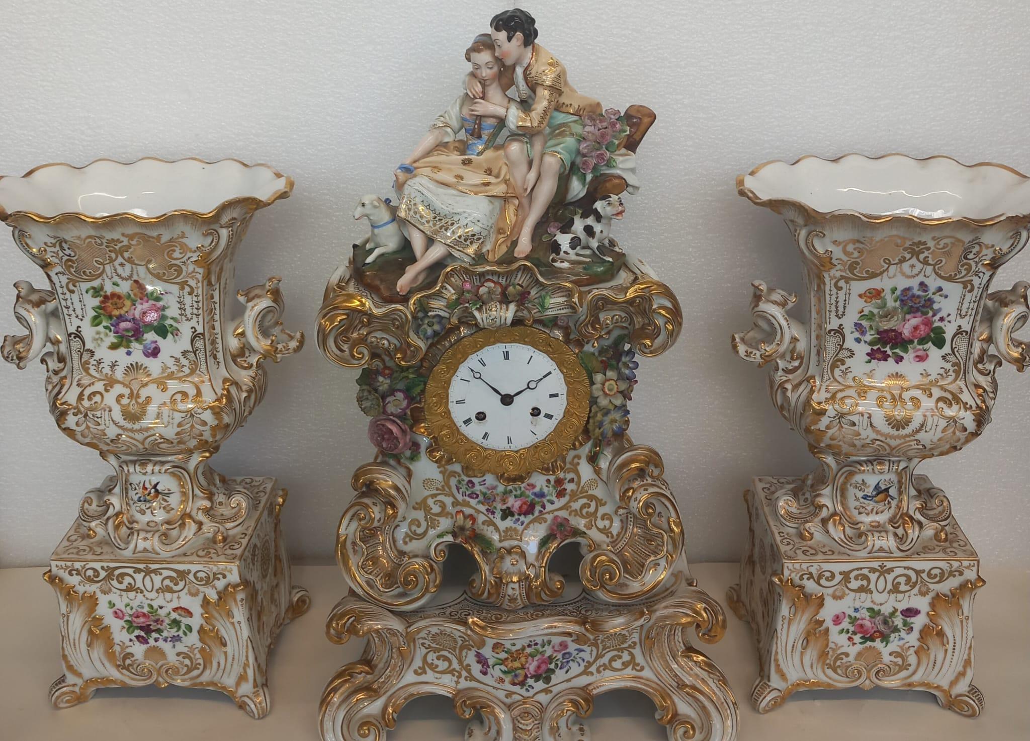19th Century An elegant mantle piece clock with vases made in Paris circa 1860 For Sale