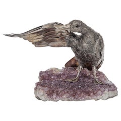 An Elegant Mario Buccellati Sterling Silver Duck Perched on an Amethyst Base