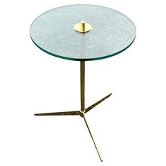 Un elegante gueridón de latón de mediados de siglo con tapa de cristal Ca' 1960's