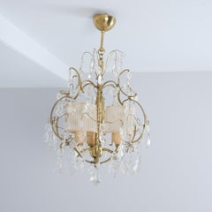 An Elegant Paavo Tynell Crystal & Brass Chandelier Model 1457-3, Taito, 1940s