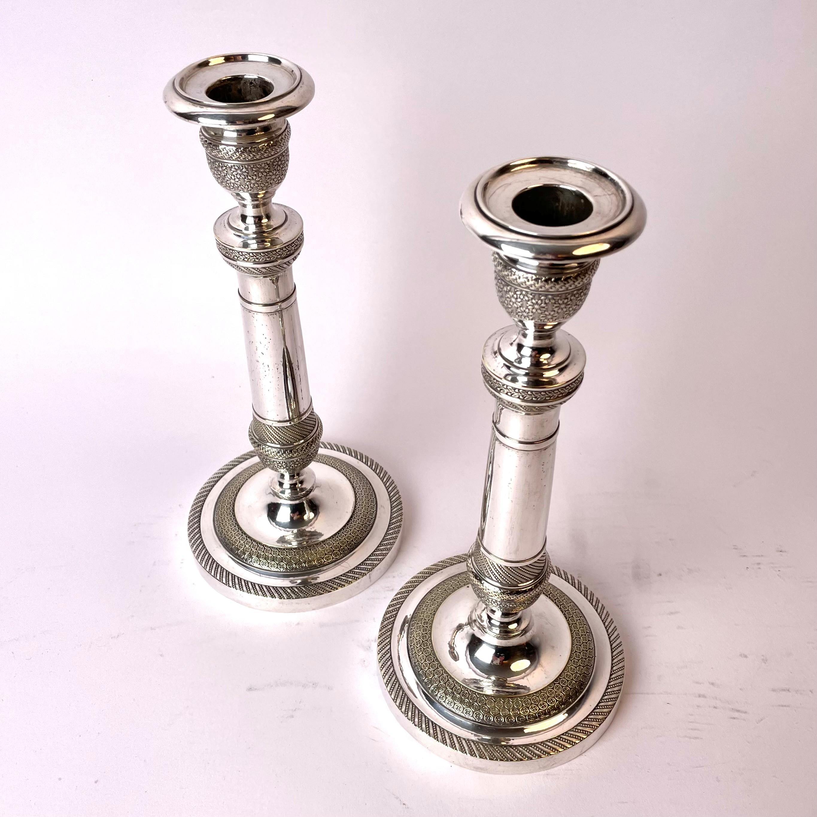 Empire An Elegant pair of empire candlesticks in Argent haché