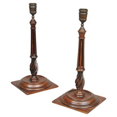 An Elegant Pair Of Georgian Style Mahogany Candlesticks