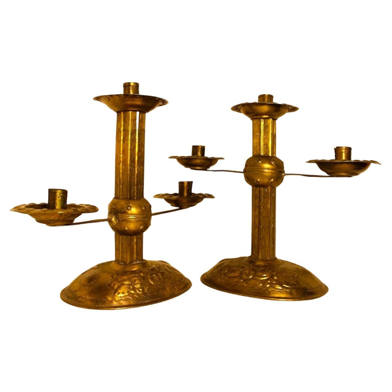 An elegant pair of gilded copper candlesticks from the 19th century  For Sale