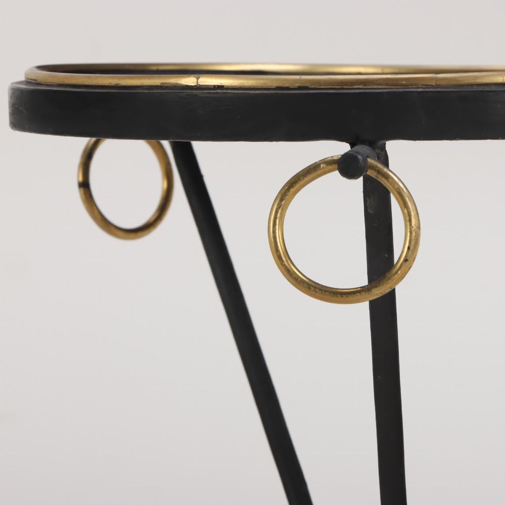 Mid-Century Modern An elegant pair of painted iron drinks tables in the manner of Jean-Michel Frank For Sale