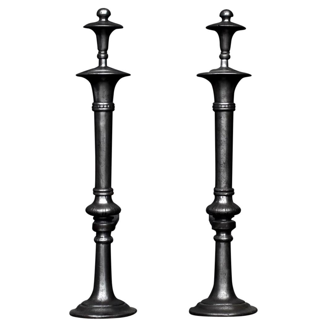 Elegant Pair of Turned Polished Cast Iron Andirons