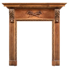 An Elegant Palladian Style Chimneypiece in Stripped Pine