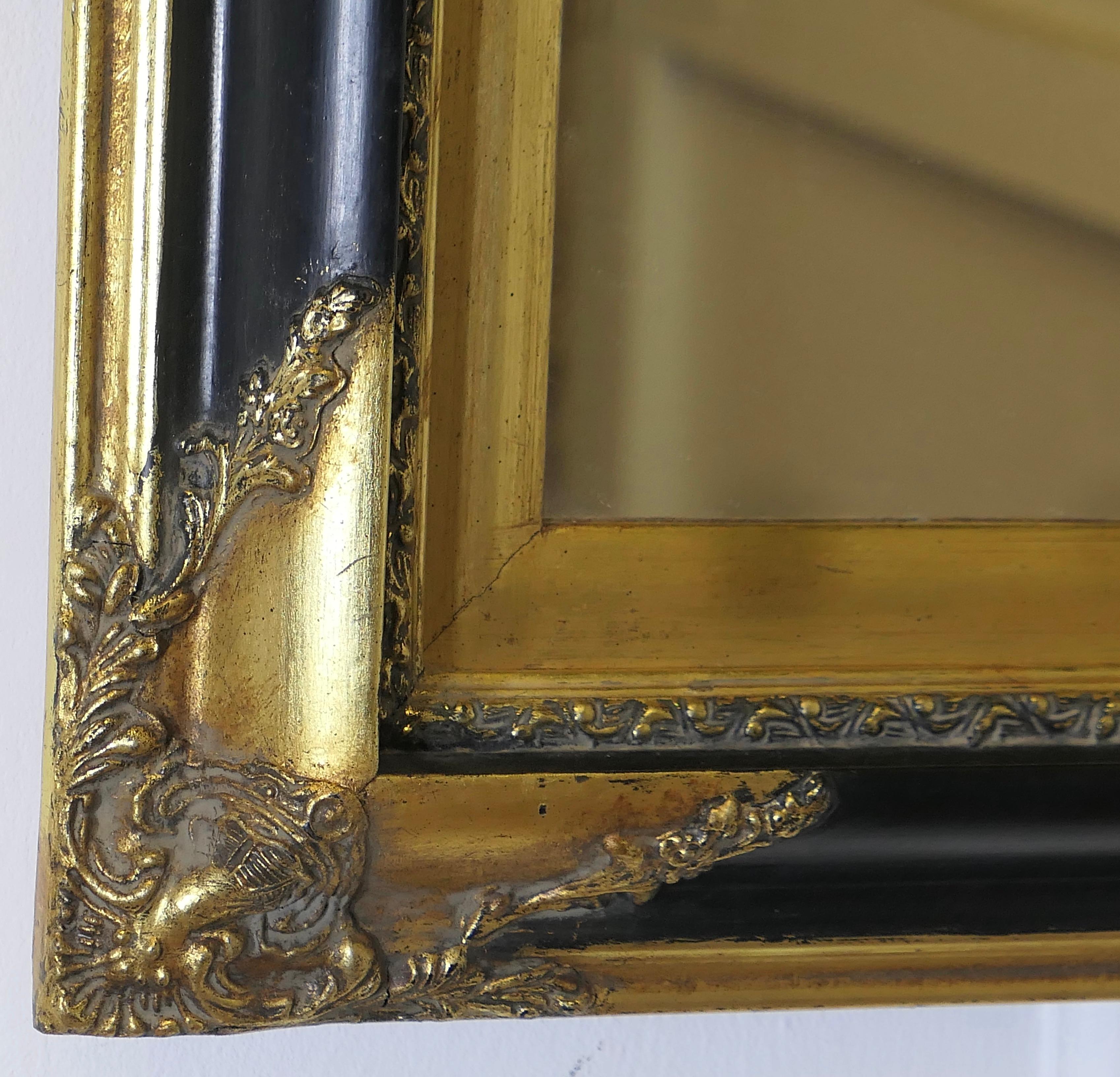 19th Century An Elegant Regency Gilt and Black Wall Mirror  This is a superb quality piece, t