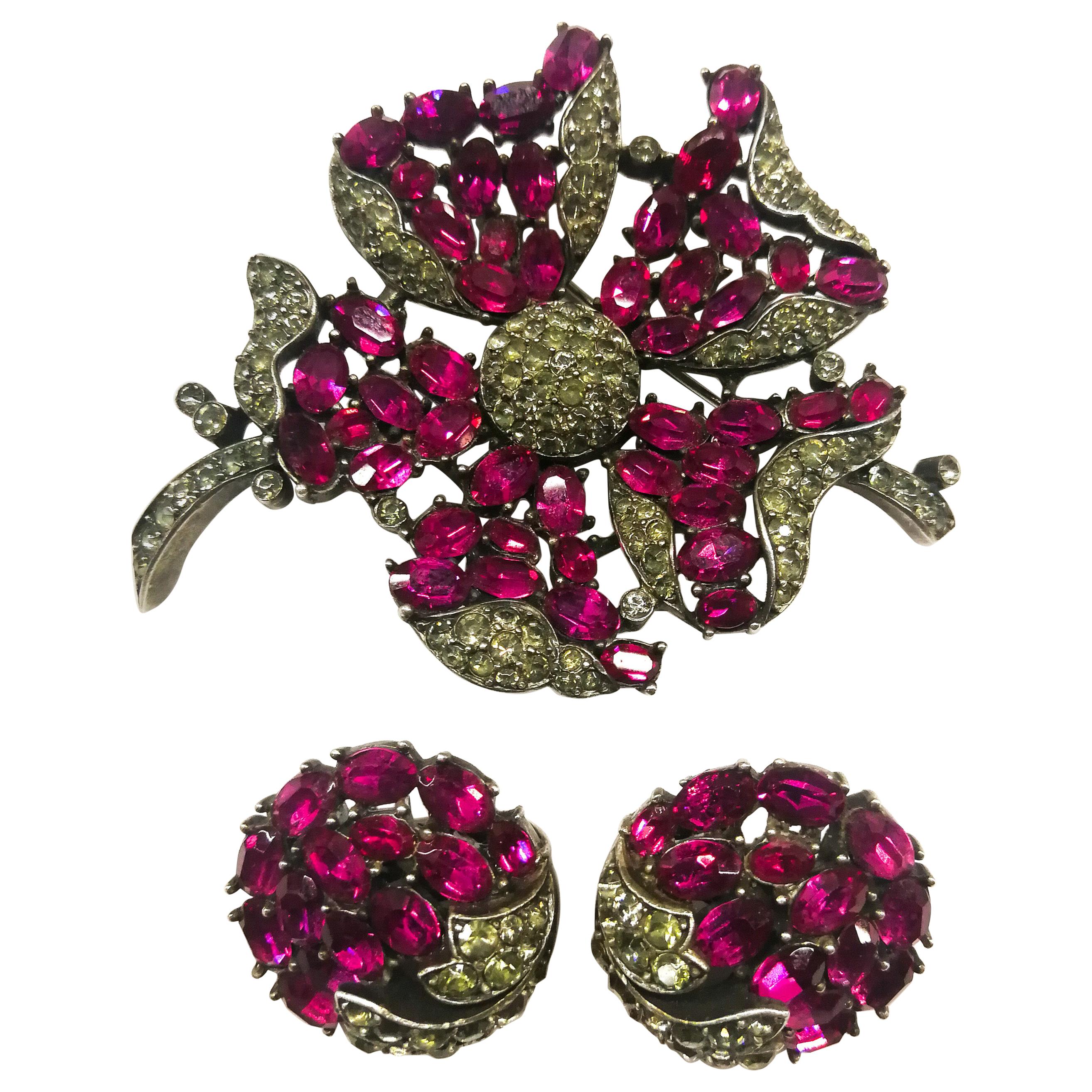 An elegant ruby and grey paste brooch and earrings, A Philippe for Trifari 1950s