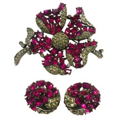 Vintage An elegant ruby and grey paste brooch and earrings, A Philippe for Trifari 1950s