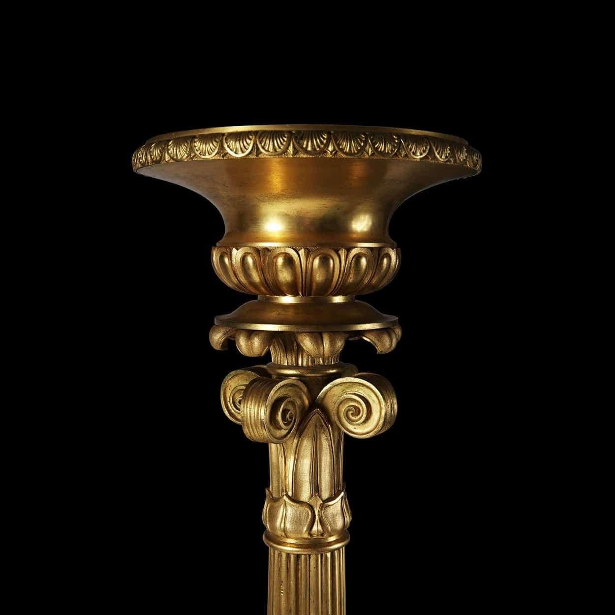 Gilt An elegant single gilt bronze torchère For Sale