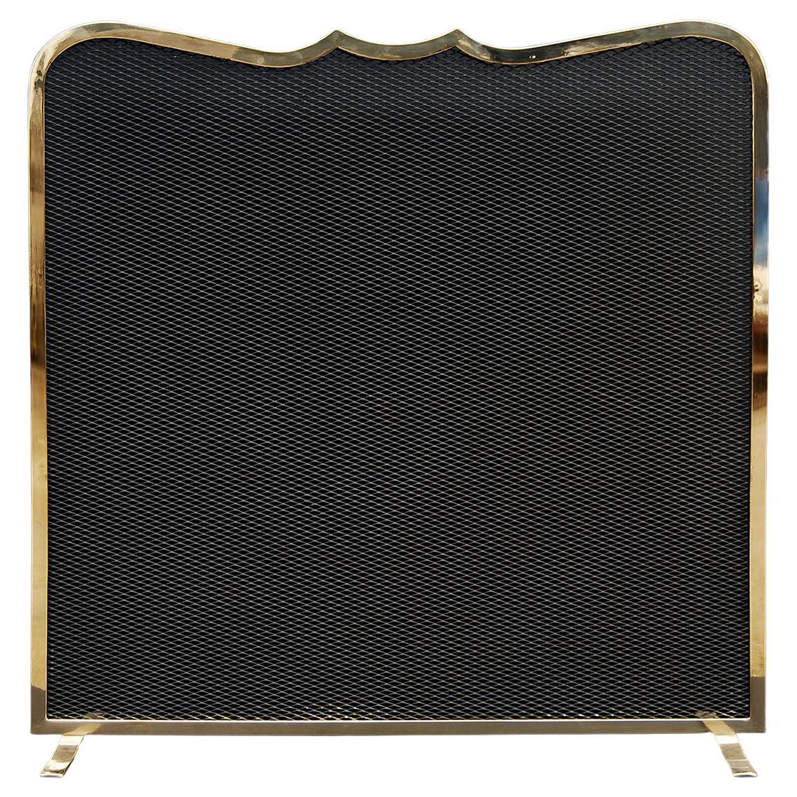 Elegantly Shaped Brass Firescreen with Serpentine Shaped Top and Black Mesh t For Sale