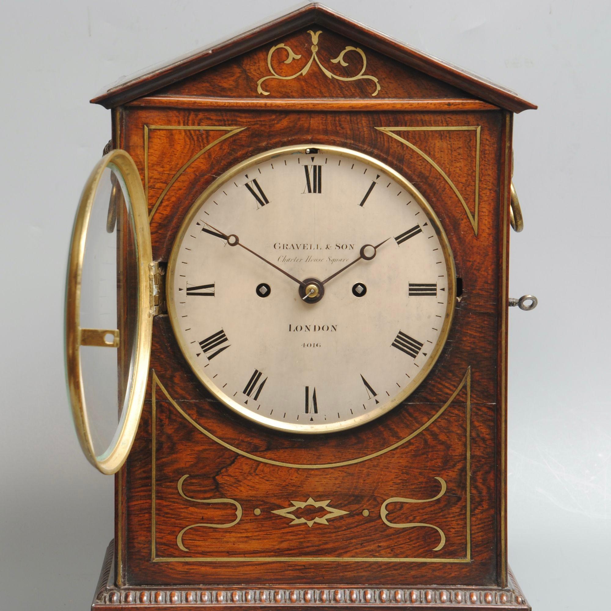 European An Elegany Regency Rosewood And Brass Inlaid Bracket Clock