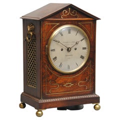 An Elegany Regency Rosewood And Brass Inlaid Bracket Clock