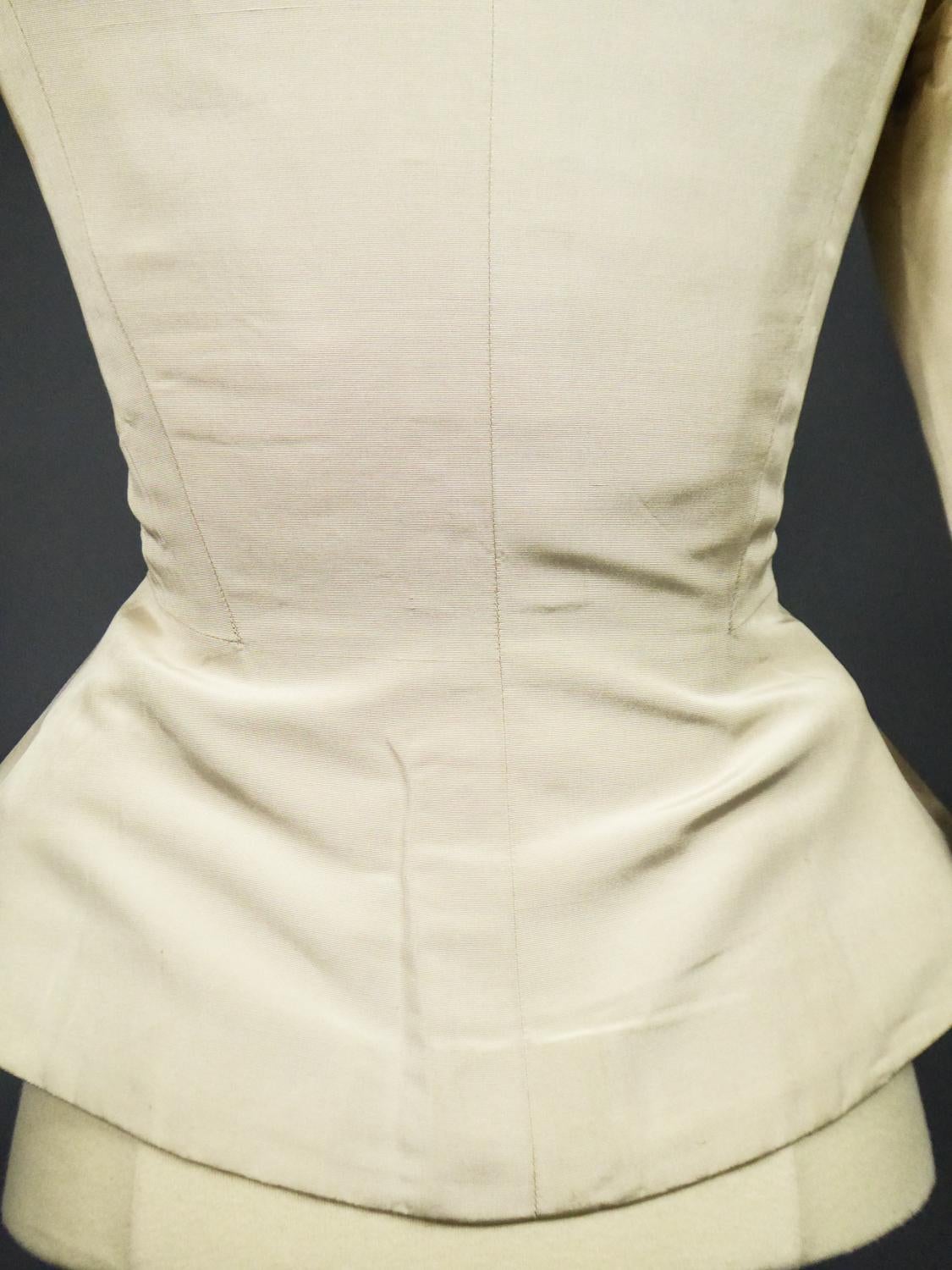 An Elsa Schiaparelli Bar Jacket in Cream Silk Numbered 89254 Circa 1947-1950 4